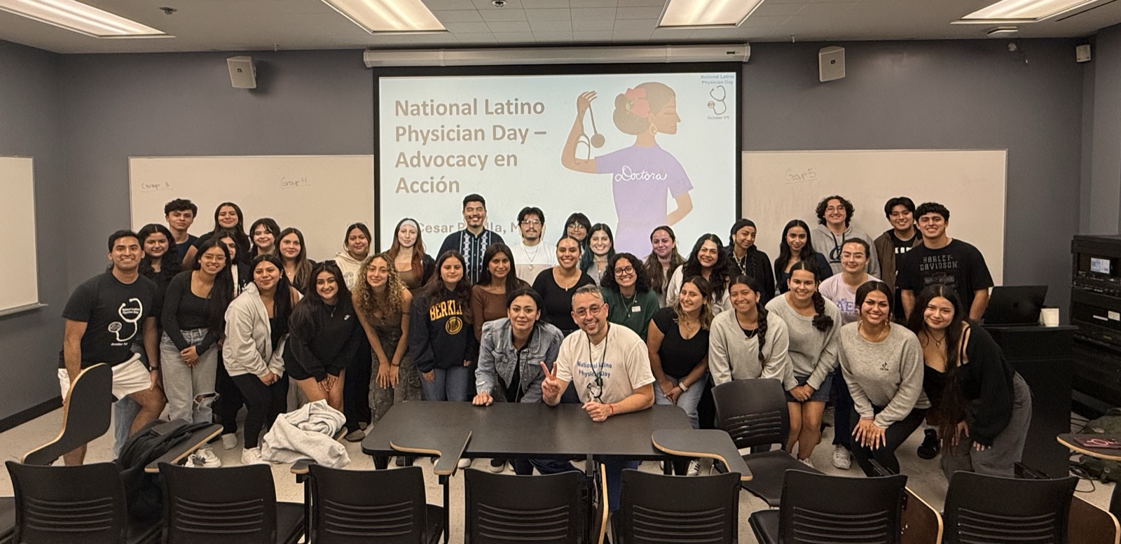 CHE members together at a health-focused gathering in a classroom